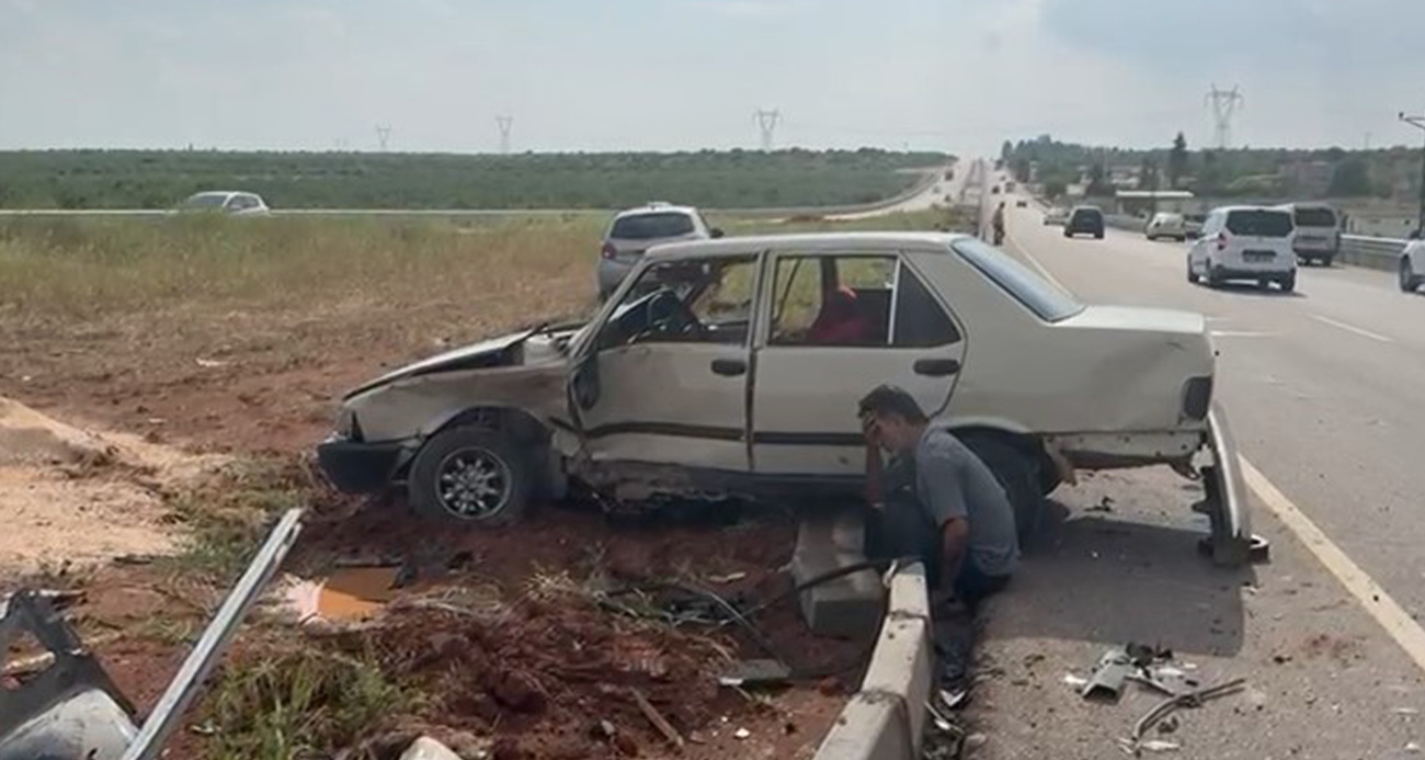 Kaza yaptığı aracının başında gözyaşı döktü